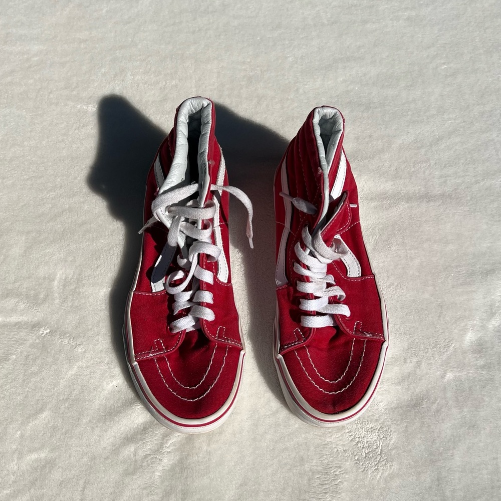 red high top vans off the wall